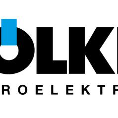 Logo von Völkel Mikroelektronik in Schwarz, mit einem blauen Element über dem Buchstaben „O“.